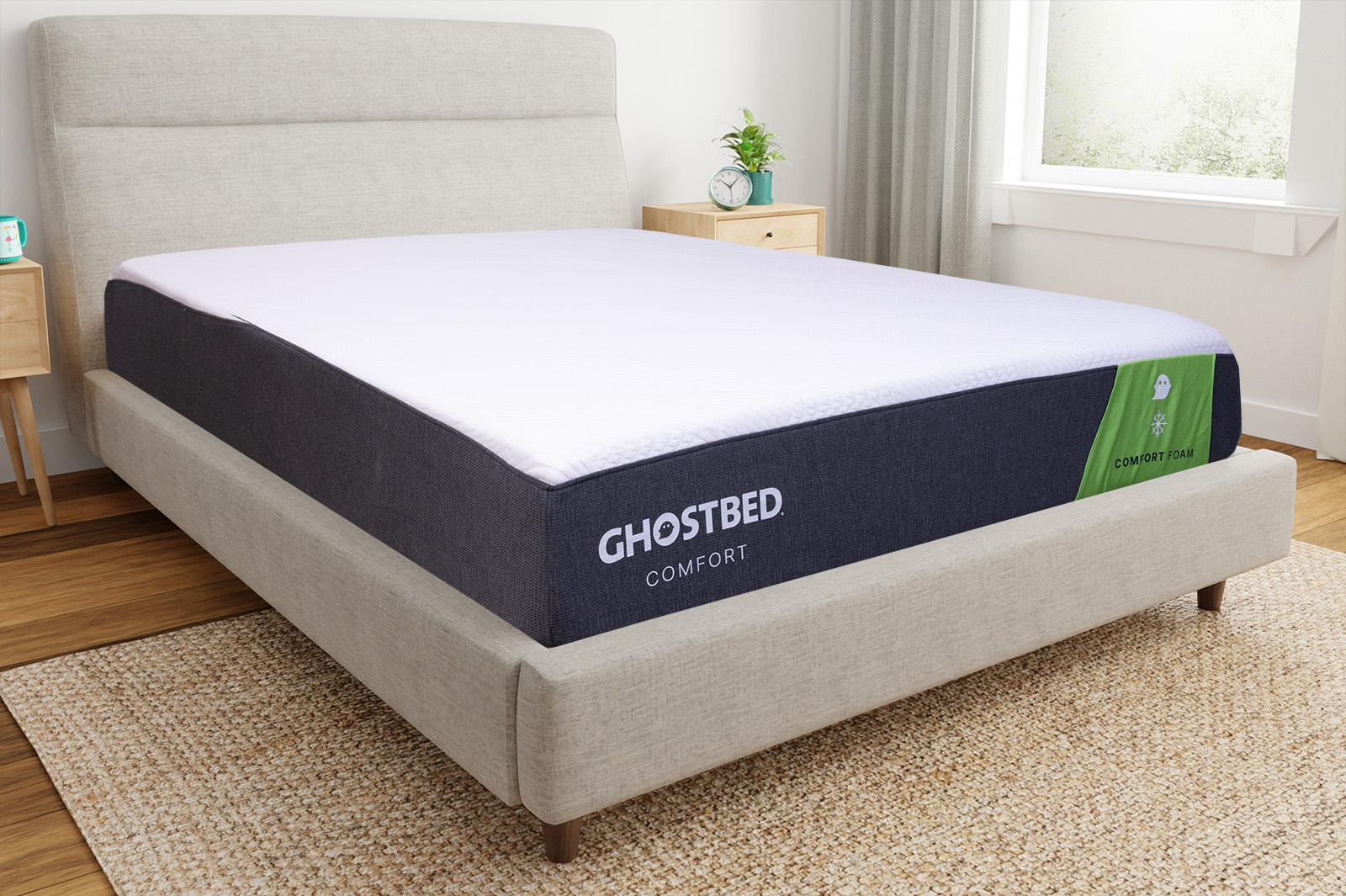 GhostbedComfortFoamCornerAngle MattressReviewscom Corner view of the GhostBed Comfort Foam mattress on a bedframe in a bedroom