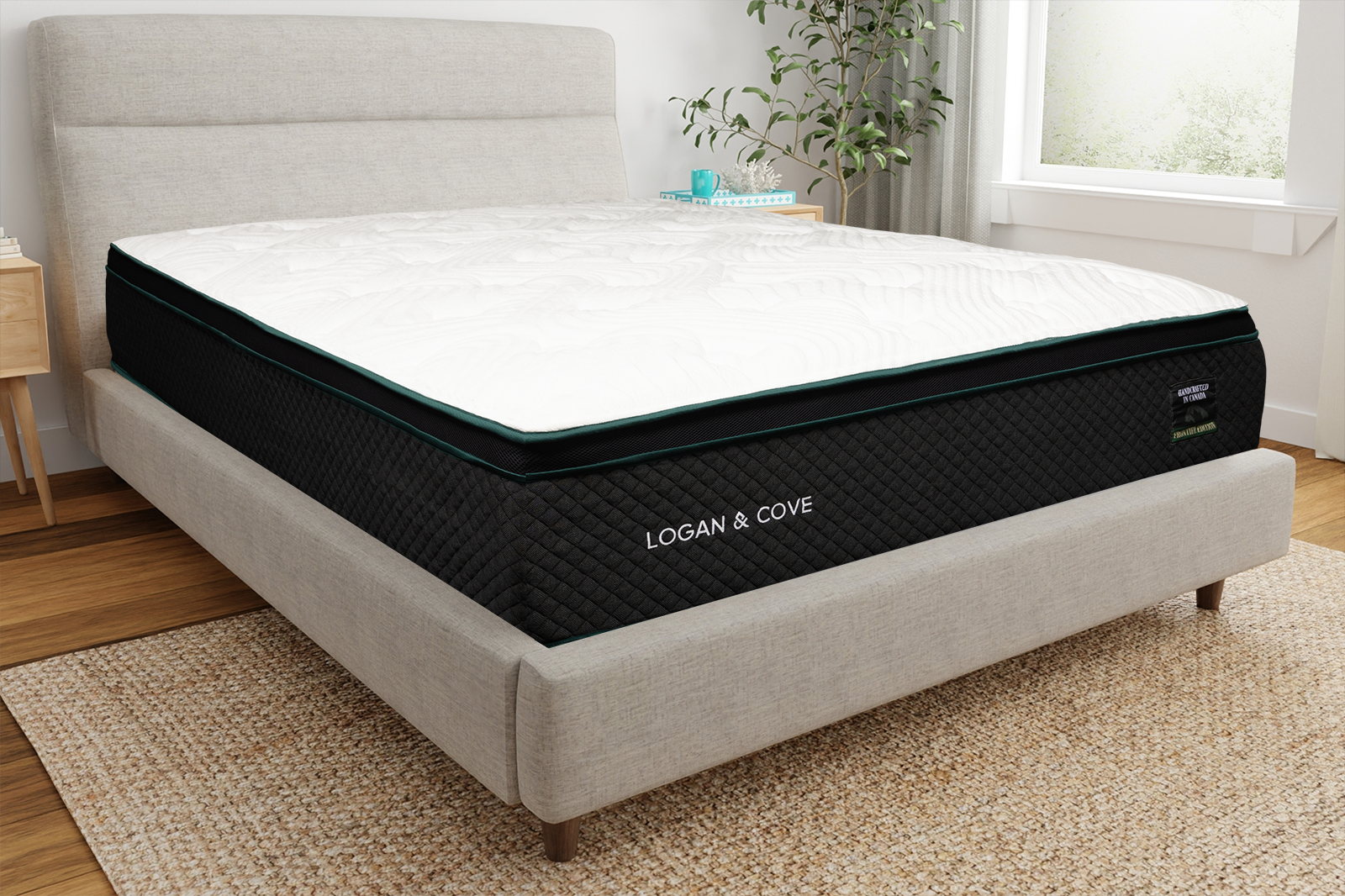 LCFrontierCornerAngle MattressReviewscom Photo of the Logan Cove Frontier mattress sitting on a bedframe in a bedroom taken from a front corner angle