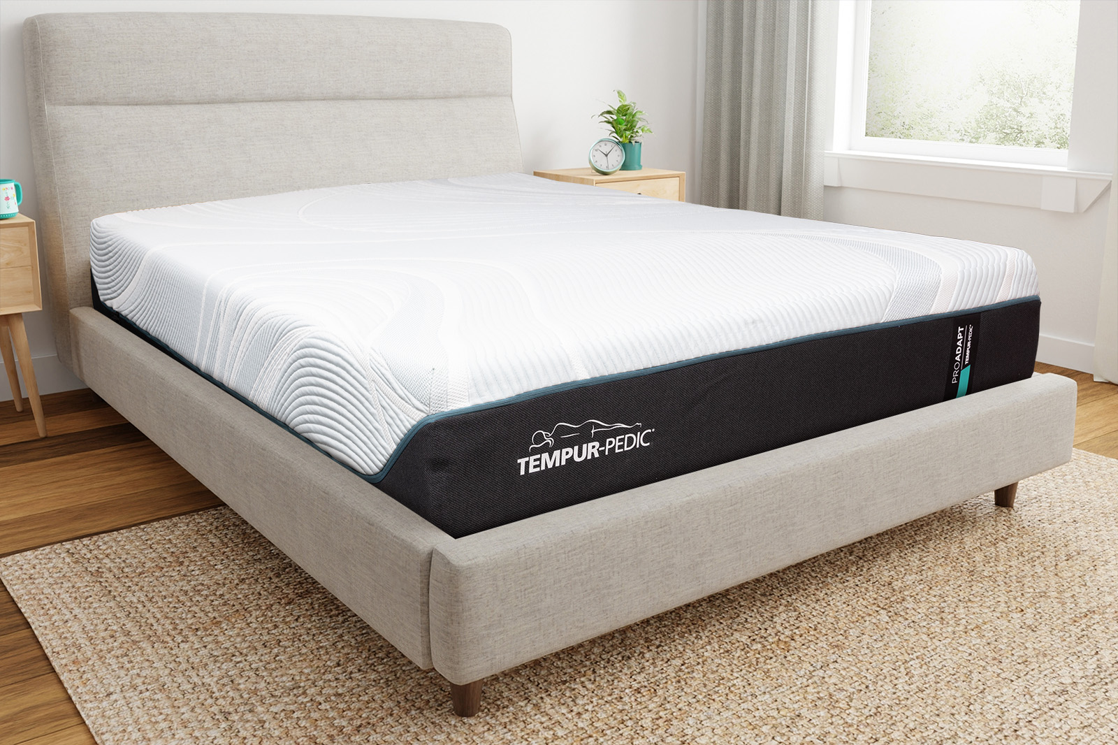 TempurpedicProAdaptTealCornerAngle MattressReviewscom Corner angle photo of a Tempur Pedic ProAdapt Teal mattress on a bedframe