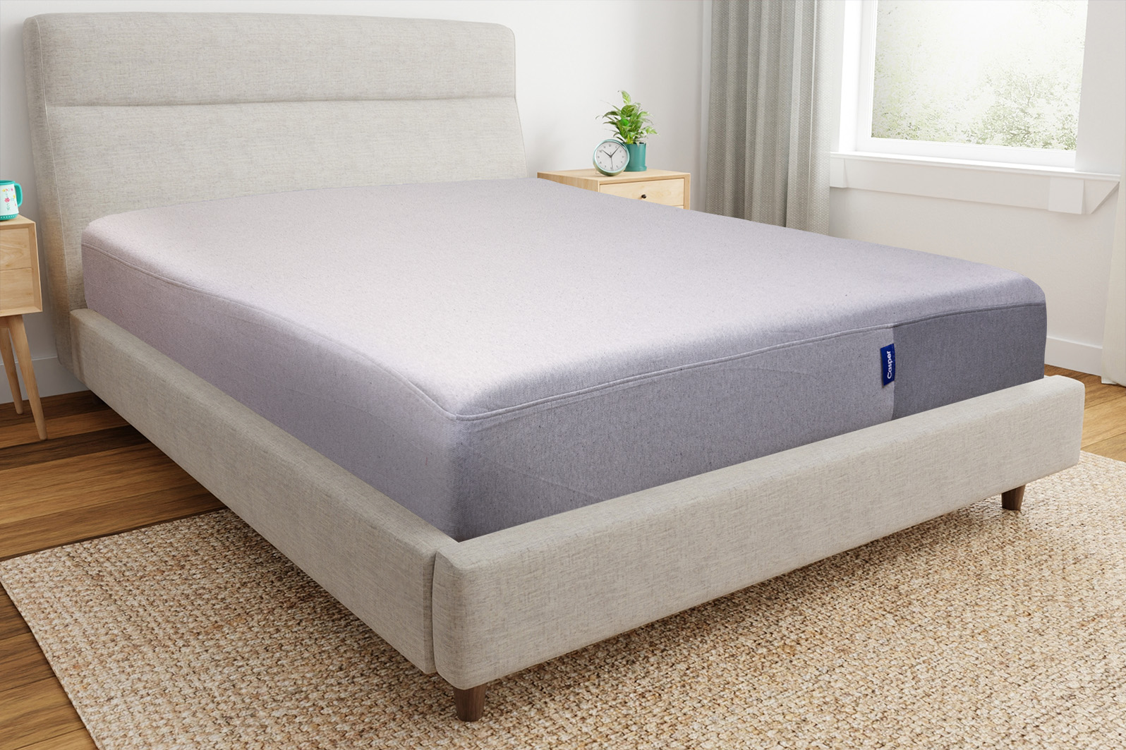 TheCasper2025CornerAngle MattressReviewscom Corner view of The Casper mattress on a bedframe in a bedroom